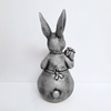 Antique Ms. Rabbit Statue