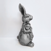 Antique Ms. Rabbit Statue